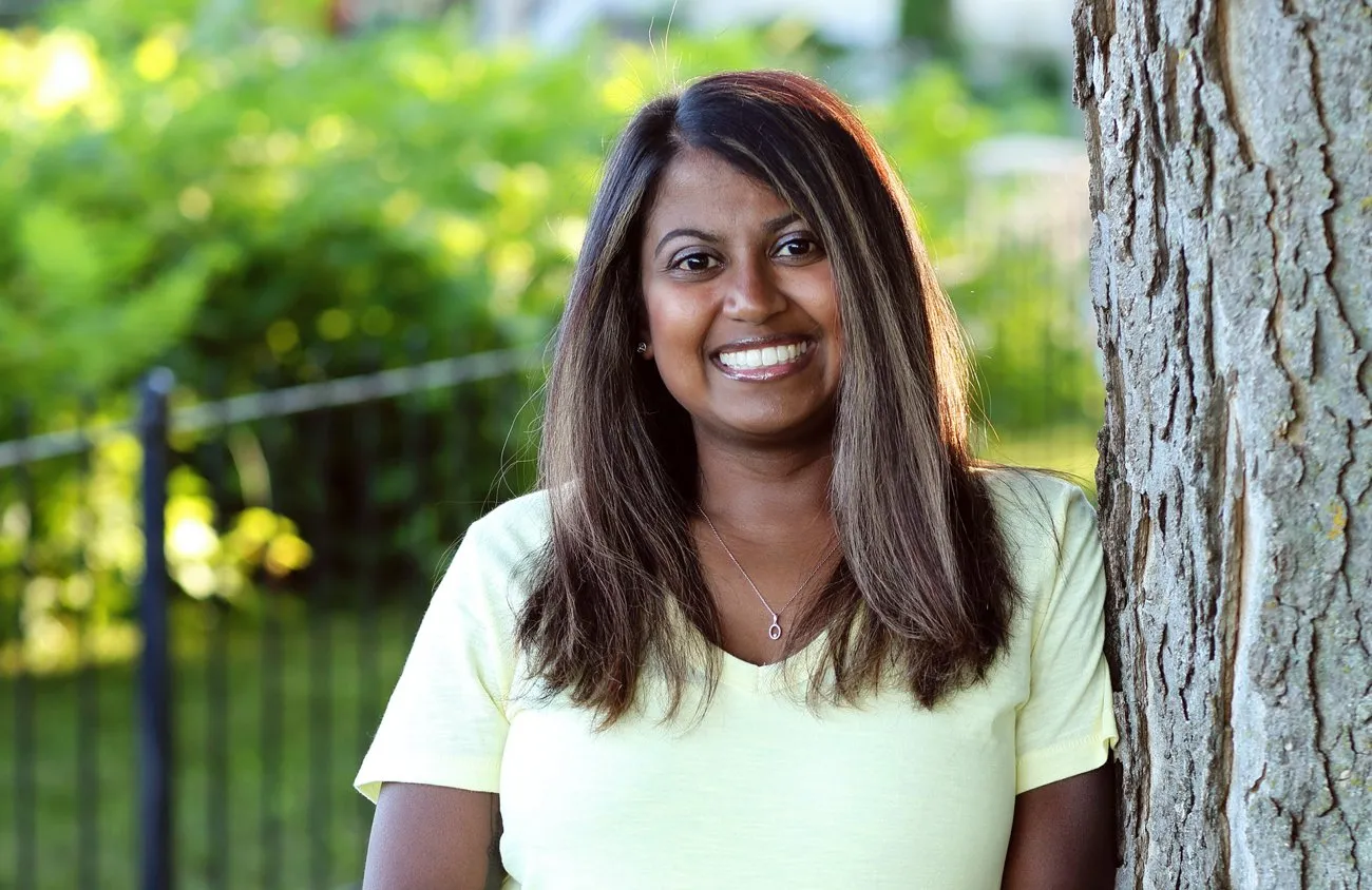 Julia Martens standing next to a tree