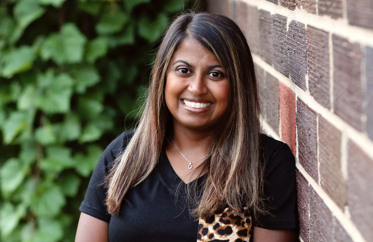 Julia Martens next to building