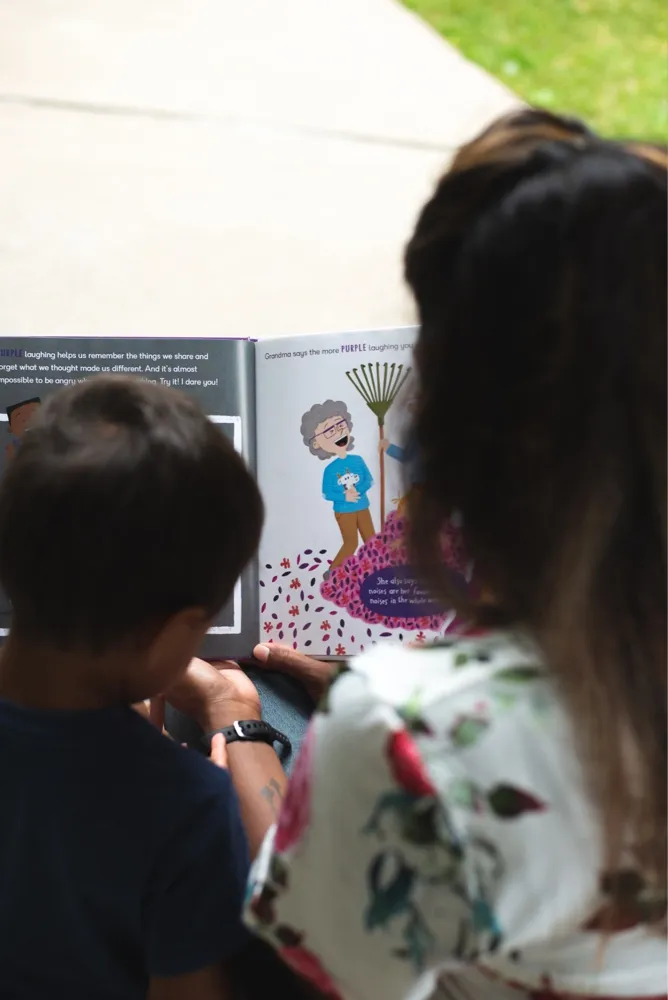 Photo of Julia Martens reading a book